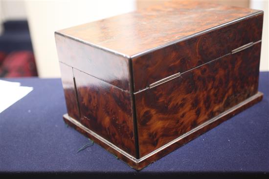 A Victorian amboyna games compendium, width 13in. height 7.5in.